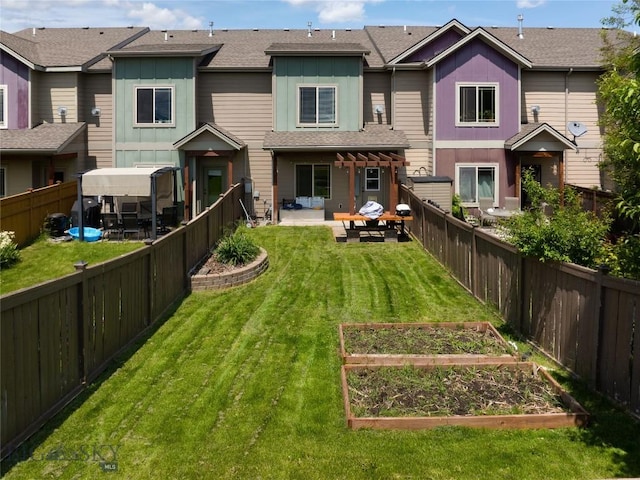 4364 Brookside Ln, Bozeman, MT 59718 - rear view of house with a garden, a patio, board and batten siding, and roof with shingles