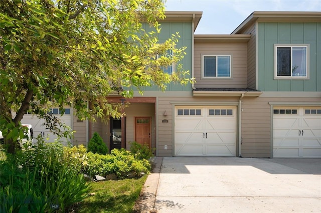 4364 Brookside Ln, Bozeman, MT 59718 - townhome / multi-family property featuring board and batten siding, concrete driveway, and an attached garage