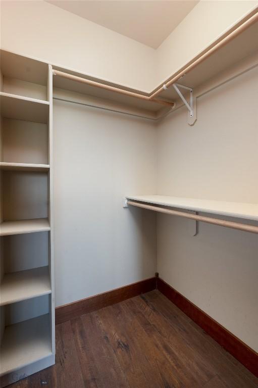 4364 Brookside Ln, Bozeman, MT 59718 - spacious closet with dark wood-style flooring