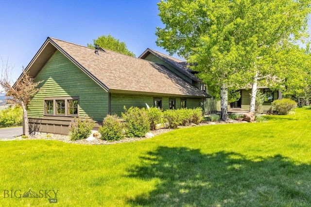 2594 Star Ridge Rd, Bozeman, MT 59715 - view of property exterior with a lawn and roof with shingles