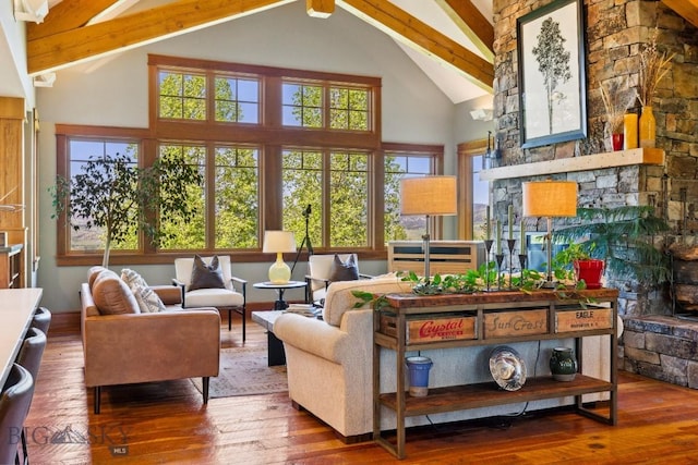 2594 Star Ridge Rd, Bozeman, MT 59715 - living room with high vaulted ceiling, hardwood / wood-style flooring, and beamed ceiling
