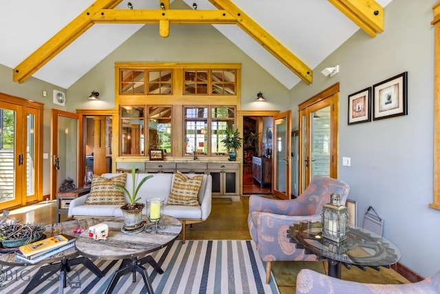 2594 Star Ridge Rd, Bozeman, MT 59715 - living room featuring high vaulted ceiling, beam ceiling, and wood finished floors