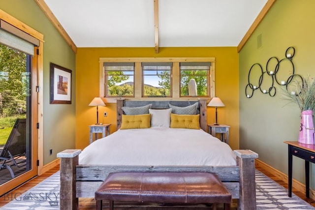 2594 Star Ridge Rd, Bozeman, MT 59715 - bedroom with access to outside and wood finished floors
