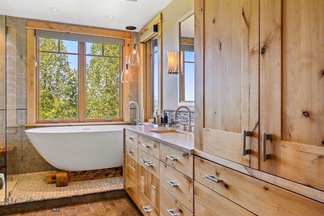 2594 Star Ridge Rd, Bozeman, MT 59715 - bathroom featuring a freestanding tub and double vanity