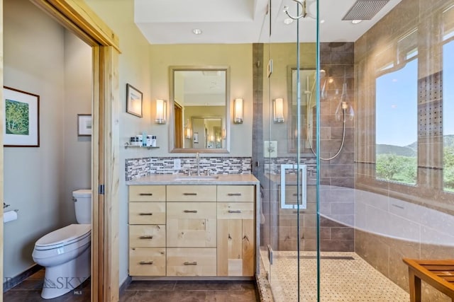 2594 Star Ridge Rd, Bozeman, MT 59715 - bathroom with a stall shower, vanity, and backsplash