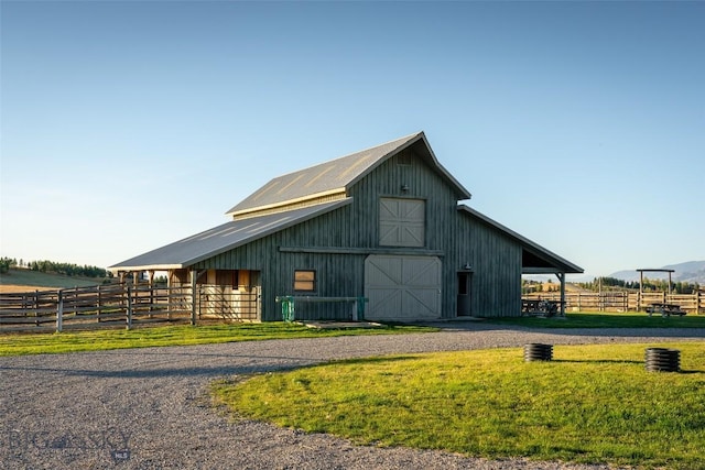 2594 Star Ridge Rd, Bozeman, MT 59715 - view of barn featuring driveway and an exterior structure