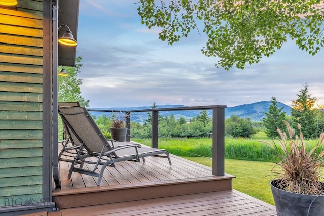 2594 Star Ridge Rd, Bozeman, MT 59715 - wooden terrace featuring a mountain view and a yard
