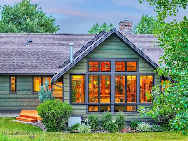 2594 Star Ridge Rd, Bozeman, MT 59715 - rear view of property with a chimney and roof with shingles