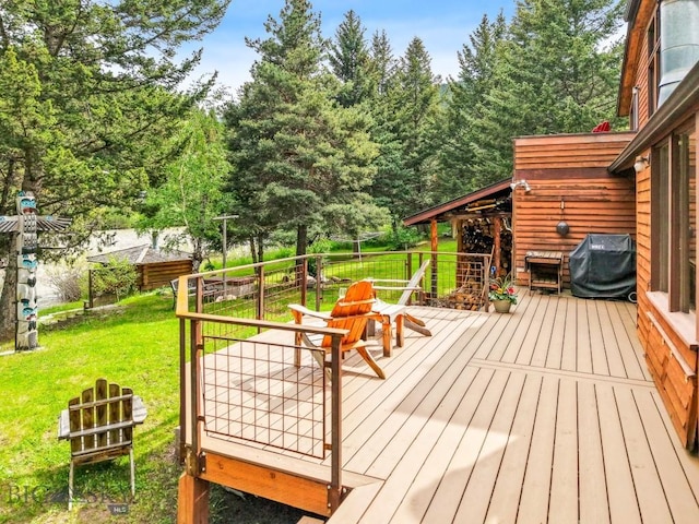 140 Luhn, Gallatin Gateway, MT 59730 - wooden deck featuring a yard