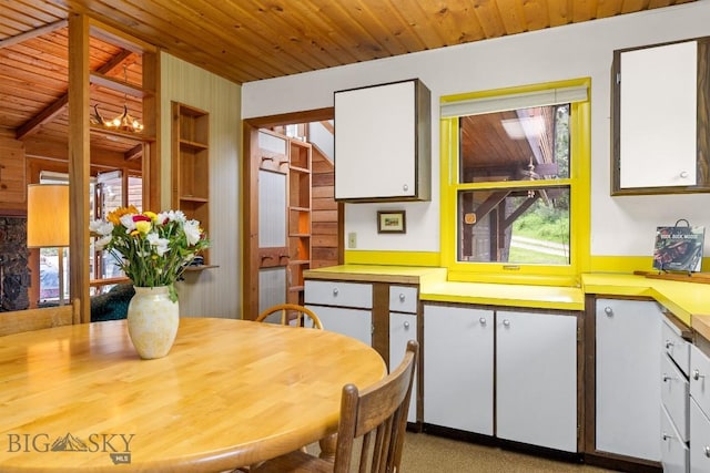 140 Luhn, Gallatin Gateway, MT 59730 - dining area with wooden ceiling and built in features