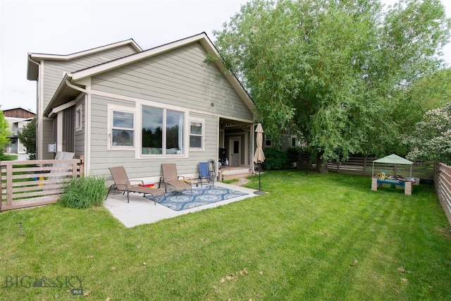 975 Jessie Way, Bozeman, MT 59715 - back of house with a patio area