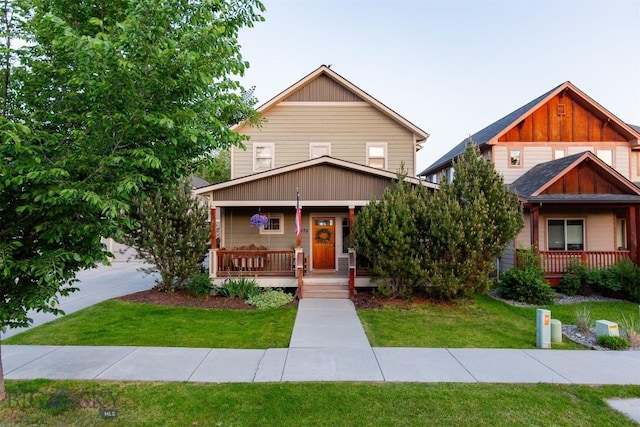 975 Jessie Way, Bozeman, MT 59715 - view of front of property with covered porch and a front lawn