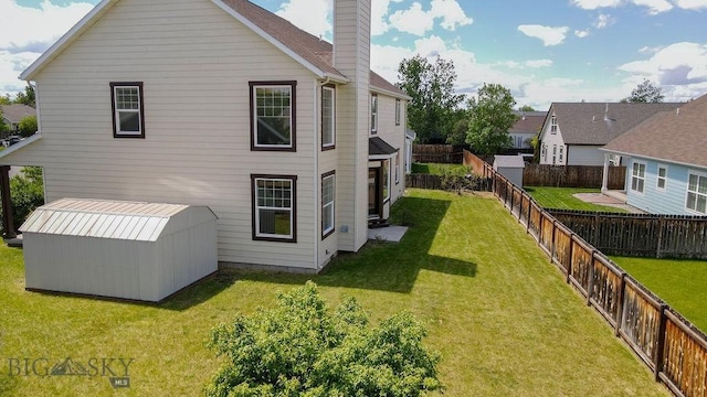 2475 Rose St, Bozeman, MT 59718 - rear view of house featuring a chimney