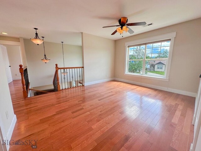 2475 Rose St, Bozeman, MT 59718 - unfurnished room with light wood-type flooring, baseboards, and ceiling fan