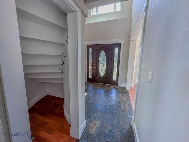 2475 Rose St, Bozeman, MT 59718 - entrance foyer featuring baseboards, stone tile flooring, and plenty of natural light