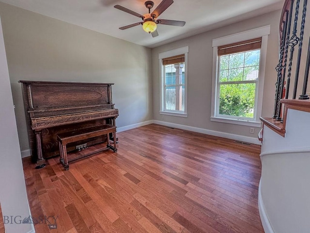 2475 Rose St, Bozeman, MT 59718 - sitting room with light wood-style floors, a ceiling fan, and baseboards
