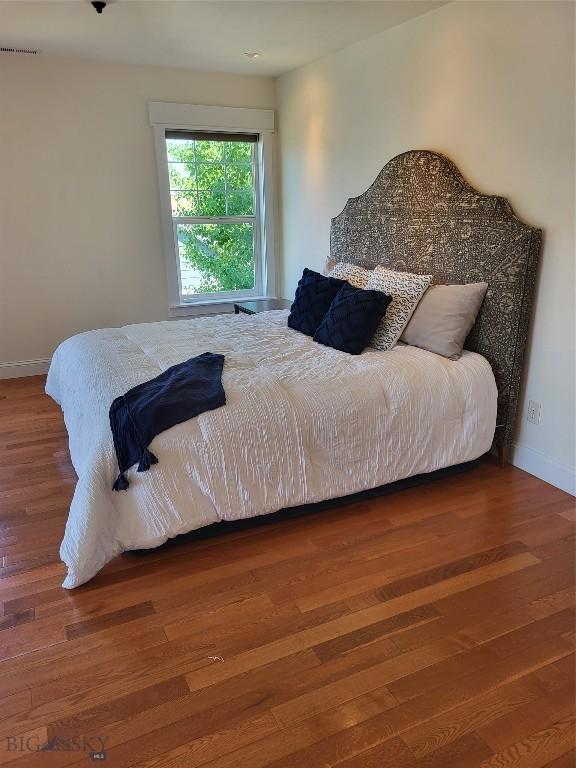 2475 Rose St, Bozeman, MT 59718 - bedroom featuring wood finished floors