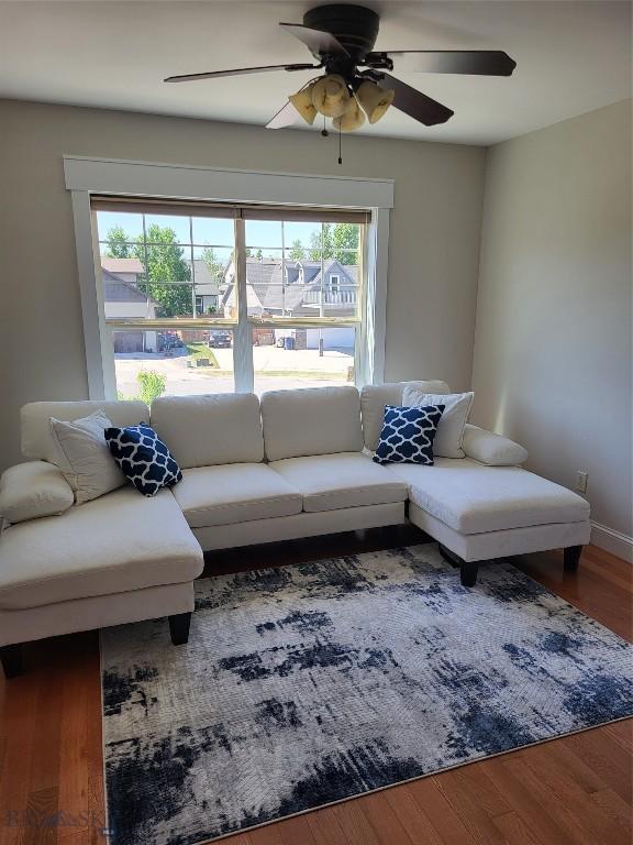 2475 Rose St, Bozeman, MT 59718 - living area with healthy amount of natural light, wood finished floors, and a ceiling fan