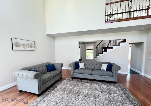 2475 Rose St, Bozeman, MT 59718 - living room with wood finished floors, stairway, and a high ceiling