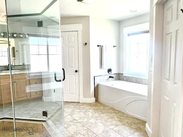 2475 Rose St, Bozeman, MT 59718 - full bath featuring a shower stall, a bath, vanity, and tile patterned flooring