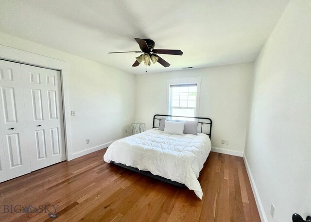 2475 Rose St, Bozeman, MT 59718 - bedroom featuring wood finished floors, a closet, and ceiling fan