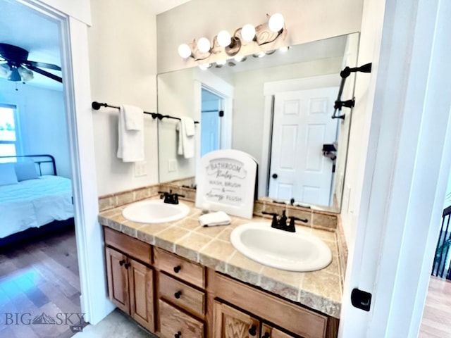 2475 Rose St, Bozeman, MT 59718 - full bath featuring connected bathroom, double vanity, and ceiling fan