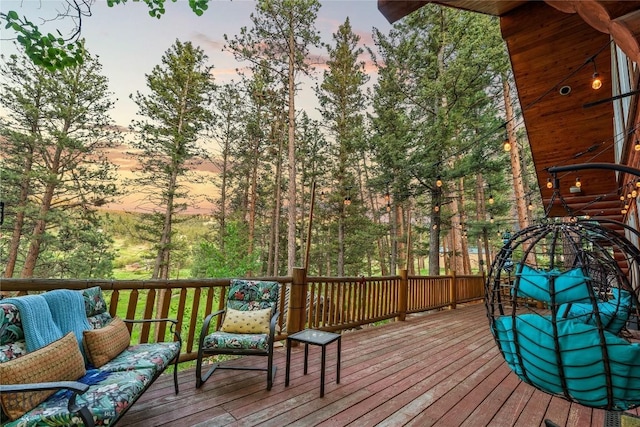 1561/1563 Colorado Gulch Dr, Helena, MT 59601 - deck at dusk featuring an outdoor living space