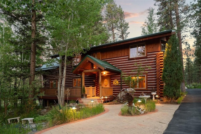 1561/1563 Colorado Gulch Dr, Helena, MT 59601 - log cabin featuring log siding