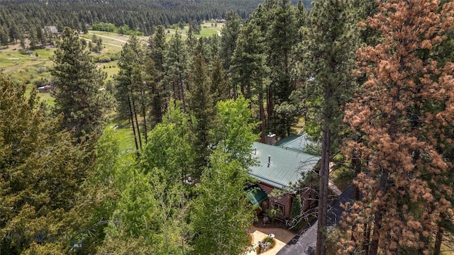 1561/1563 Colorado Gulch Dr, Helena, MT 59601 - aerial view of property and surrounding area with a heavily wooded area