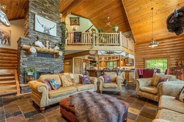 1561/1563 Colorado Gulch Dr, Helena, MT 59601 - living room featuring wooden ceiling, high vaulted ceiling, a fireplace, a ceiling fan, and stairs