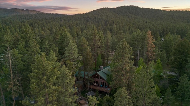 1561/1563 Colorado Gulch Dr, Helena, MT 59601 - view of mountain backdrop with a heavily wooded area