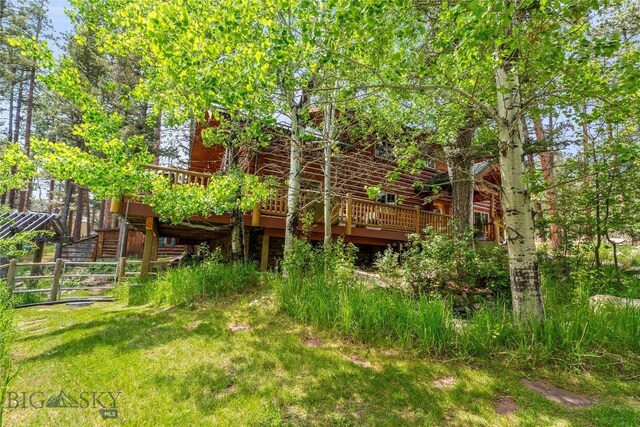 1561/1563 Colorado Gulch Dr, Helena, MT 59601 - back of house with a deck