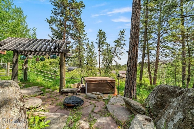 1561/1563 Colorado Gulch Dr, Helena, MT 59601 - view of patio / terrace featuring a hot tub and a fire pit