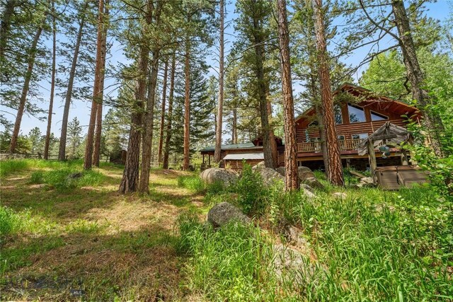 1561/1563 Colorado Gulch Dr, Helena, MT 59601 - view of yard featuring a deck