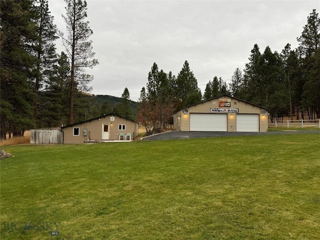 1561/1563 Colorado Gulch Dr, Helena, MT 59601 - view of front of property with a garage and an outdoor structure