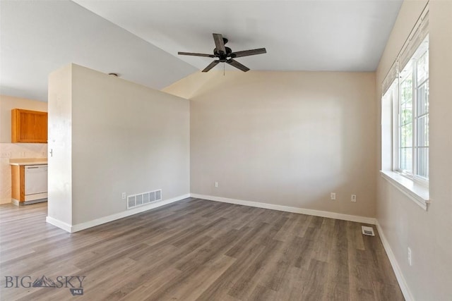 2603 Snapdragon, Bozeman, MT 59718 - unfurnished room featuring ceiling fan, wood finished floors, lofted ceiling, and baseboards