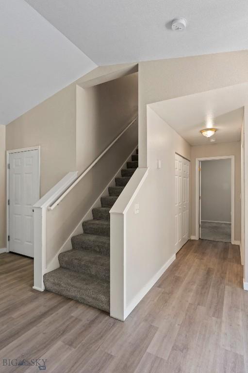 2603 Snapdragon, Bozeman, MT 59718 - stairway featuring wood finished floors and baseboards