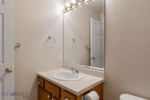 2603 Snapdragon, Bozeman, MT 59718 - half bathroom with vanity and toilet