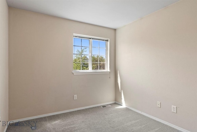 2603 Snapdragon, Bozeman, MT 59718 - carpeted empty room with baseboards