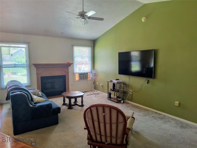 1006 E Missoula, Belgrade, MT 59714 - carpeted living area with vaulted ceiling, a ceiling fan, baseboards, and a fireplace