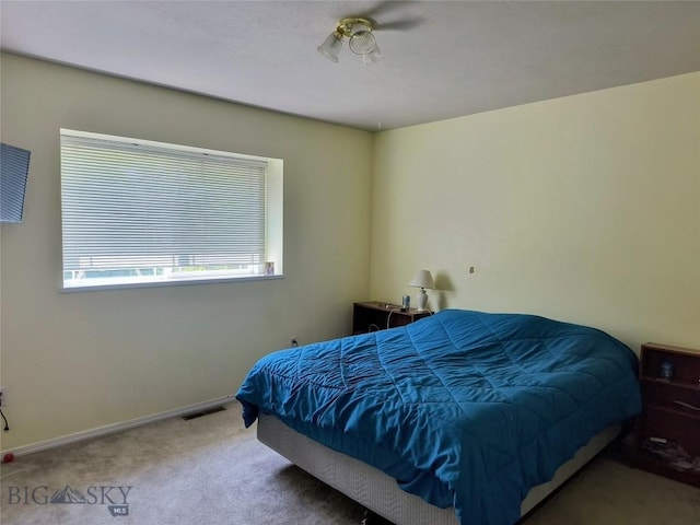 1006 E Missoula, Belgrade, MT 59714 - bedroom featuring carpet flooring and baseboards