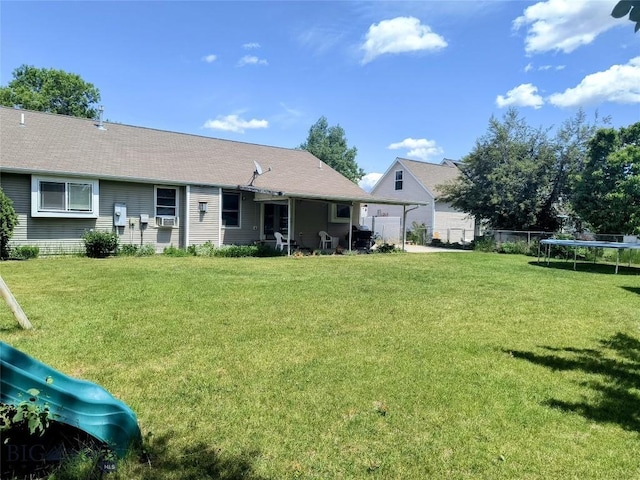 1006 E Missoula, Belgrade, MT 59714 - rear view of house featuring a trampoline