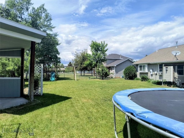 1006 E Missoula, Belgrade, MT 59714 - view of green lawn with a trampoline