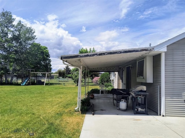 1006 E Missoula, Belgrade, MT 59714 - view of yard with a playground and a patio