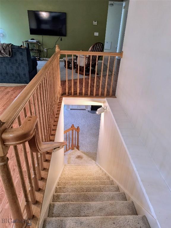 1006 E Missoula, Belgrade, MT 59714 - stairs featuring carpet