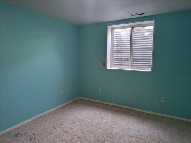 1006 E Missoula, Belgrade, MT 59714 - carpeted empty room featuring baseboards