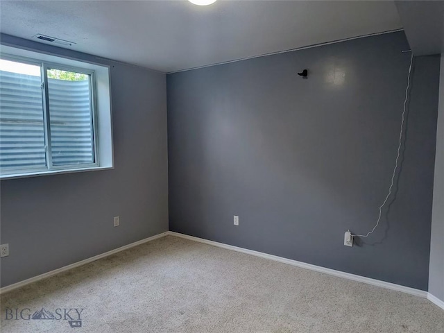 1006 E Missoula, Belgrade, MT 59714 - carpeted empty room featuring baseboards