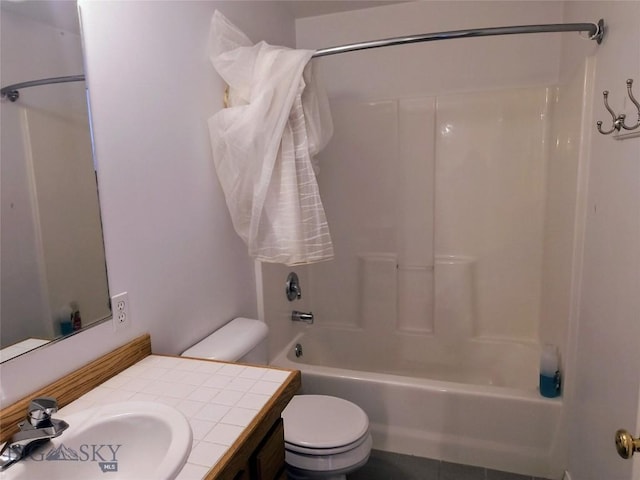 1006 E Missoula, Belgrade, MT 59714 - bathroom featuring toilet, vanity, and bathing tub / shower combination