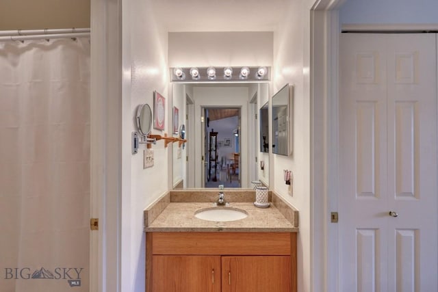 155 Aurora Lights Dr Unit B-19, Big Sky, MT 59716 - bathroom featuring vanity and curtained shower