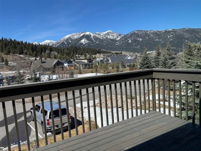 155 Aurora Lights Dr Unit B-19, Big Sky, MT 59716 - wooden terrace with a mountain view and a residential view